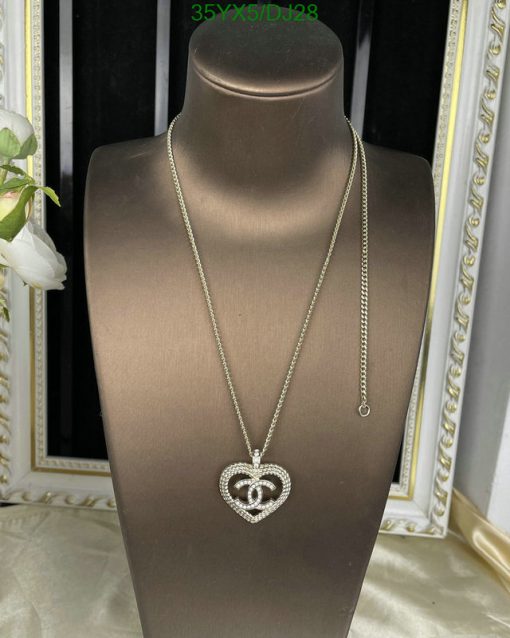 Heart pendant necklace on mannequin display.