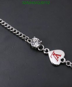 Silver bracelet with diamond charm and engraved heart.