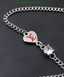 Silver heart pendant necklace with crystal detail.