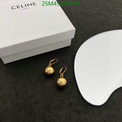 Gold spherical earrings with Celine box.