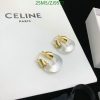 Celine gold and acrylic hoop earrings on display.