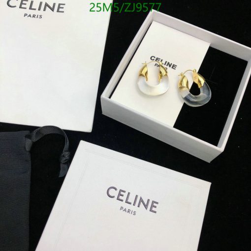 Celine Paris branded earrings with packaging.