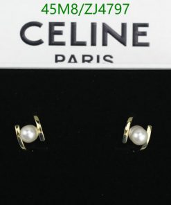 Celine Paris pearl earrings on display box