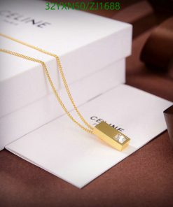 Gold bar-shaped pendant necklace on elegant packaging.