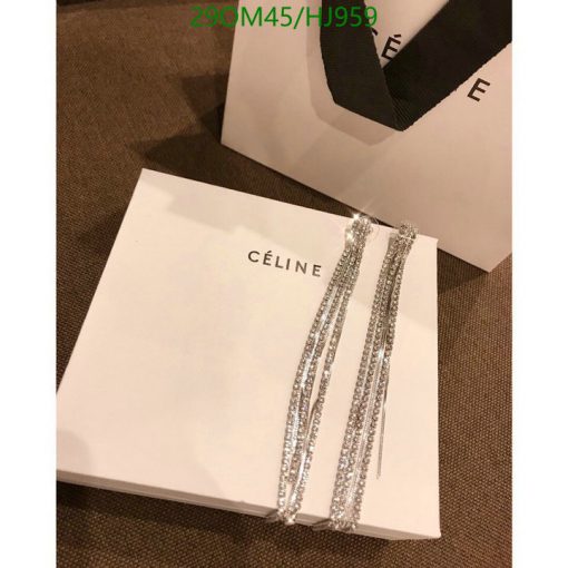 Celine brand box with sparkly jewelry on top.