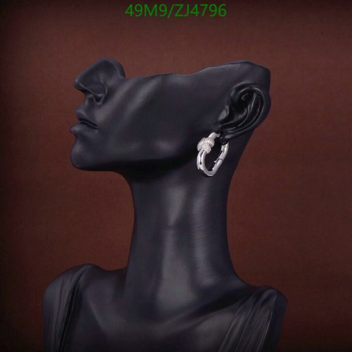 Mannequin head showcasing stylish earring.