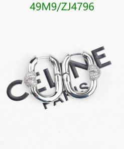 Silver designer logo earrings with sparkle detail.