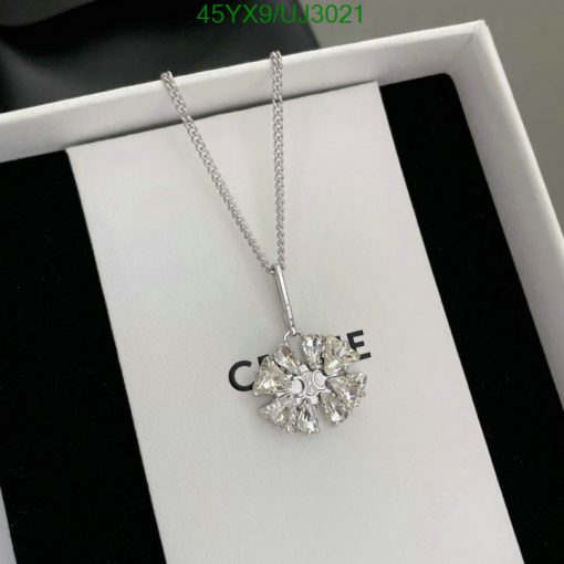 Silver diamond pendant necklace in box.