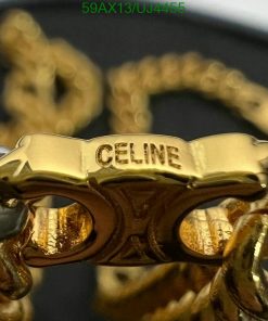 Gold Celine brand sunglasses close-up.