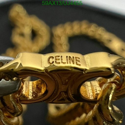 Gold Celine brand sunglasses close-up.