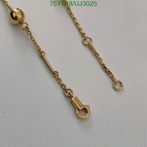 Gold chain with clasp detail on white background.