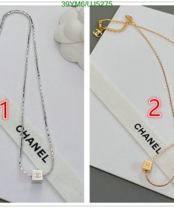 Silver and gold chain necklaces with brand name tags.