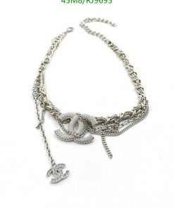 Silver designer chain necklace with pendant.