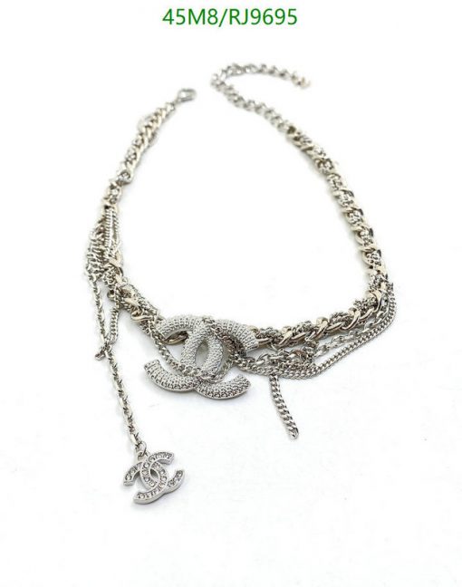 Silver designer chain necklace with pendant.