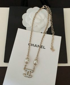 Chanel necklace with logo pendant and pearls