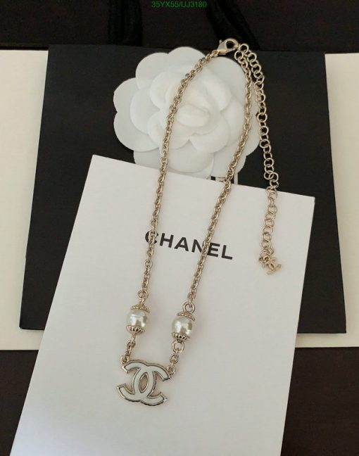 Chanel necklace with logo pendant and pearls