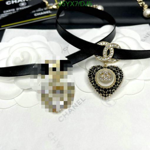 Designer choker necklaces on white background.