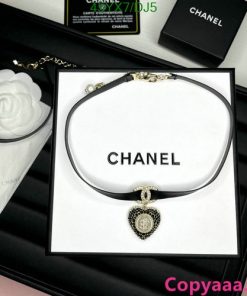 Chanel necklace display with packaging and logo.