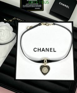 Chanel necklace on display with packaging