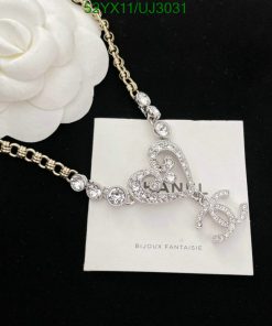 Elegant crystal heart bracelet with floral design.