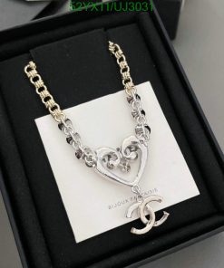 Silver heart pendant necklace in box.