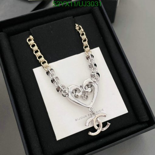 Silver heart pendant necklace in box.