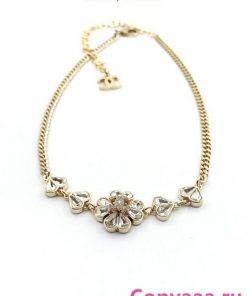 Gold flower bracelet jewelry accessory with watermark.