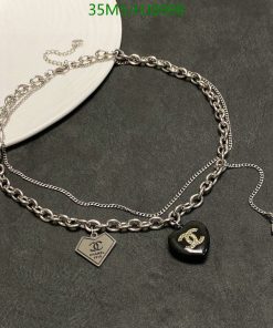 Designer silver chain necklace with logo charms.