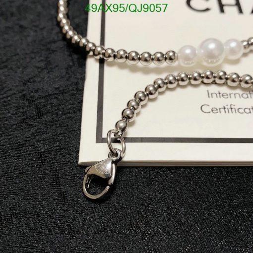 Silver bead necklace with lobster clasp and certificate.