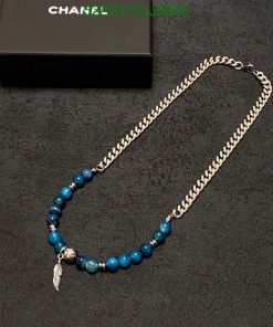 Silver chain necklace with blue beads and charm