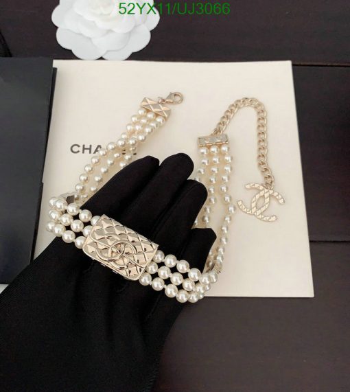 Elegant pearl bracelet and necklace on display.