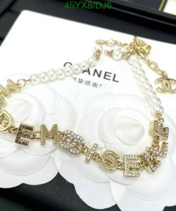 Pearl bracelet with gold-tone letter charms.