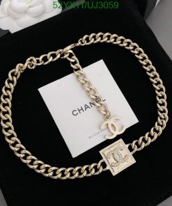 Gold chain bracelet with designer charms and logo.