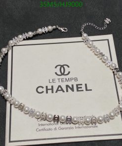 Pearl necklace on Chanel certificate.