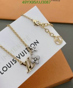 Designer logo chain bracelet on branded card.