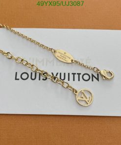 Gold-tone chain necklace with designer logo pendant.