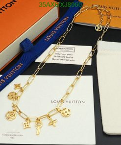 Louis Vuitton gold charm necklace with box and packaging.