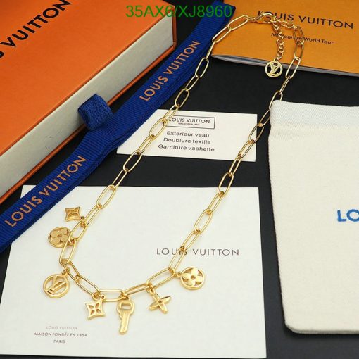 Louis Vuitton gold charm necklace with box and packaging.