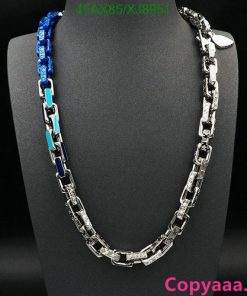 Elegant silver and blue chain necklace on black display.