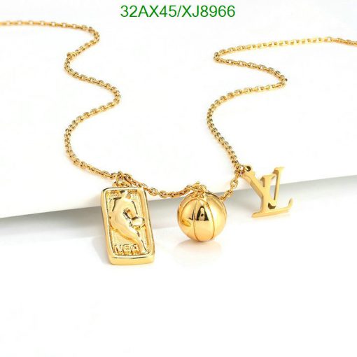 Gold pendant necklace with charm and logo designs.