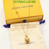 Louis Vuitton gold necklace with box and dust bag.