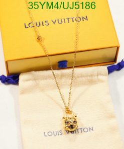 Louis Vuitton gold necklace with box and dust bag.