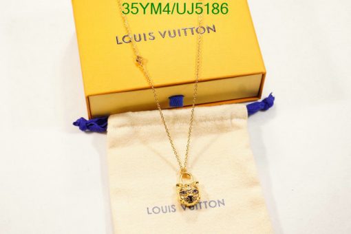 Louis Vuitton gold necklace with box and dust bag.