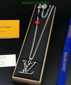 Silver designer logo necklace with packaging.