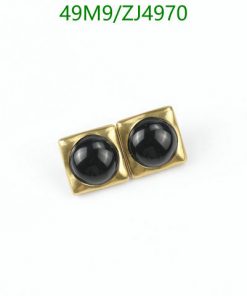 Vintage black onyx cufflinks on white background.