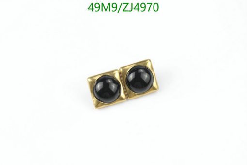 Vintage black onyx cufflinks on white background.