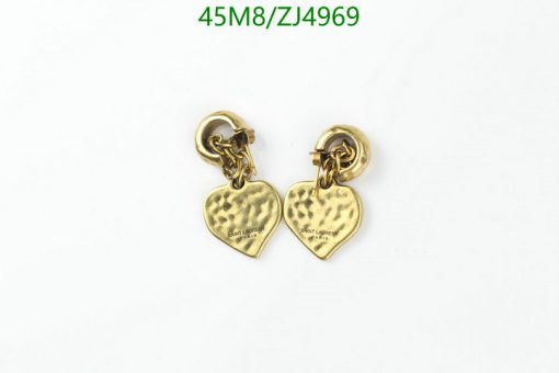 Gold heart-shaped earrings on white background.