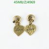 Gold heart-shaped "Love" inscribed earrings on white.