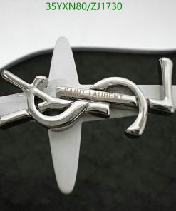 Silver designer logo bracelet close-up.