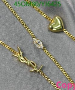 Gold necklaces with heart pendant and Arabic script.